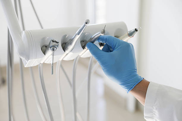 Professional Tooth Extraction technician working in Friendswood, TX